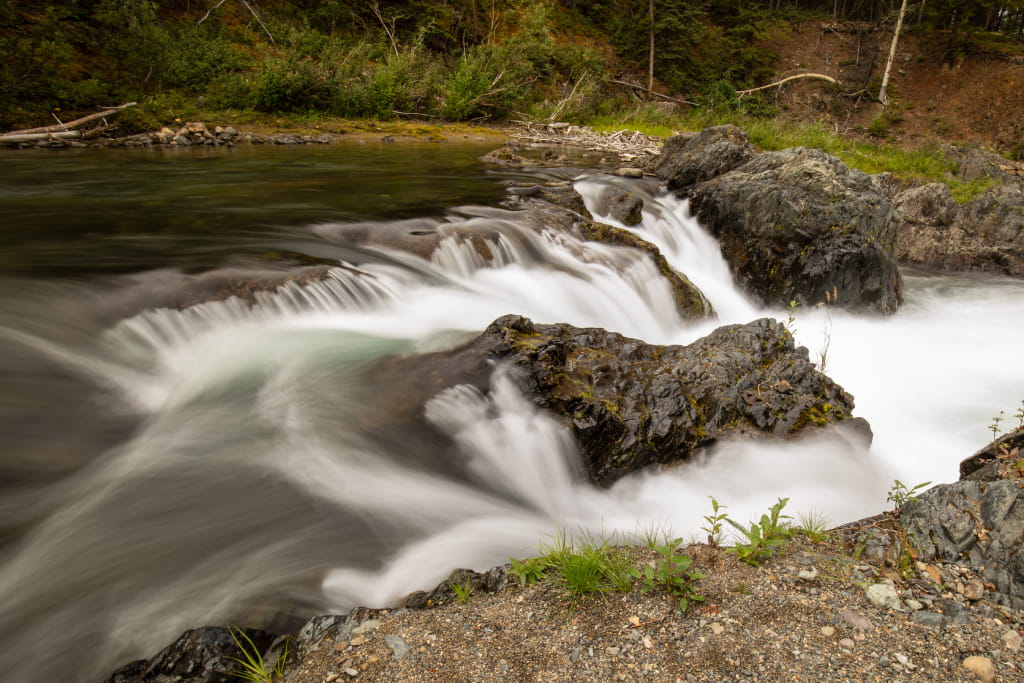 water flowing softly on a river in atlin bc